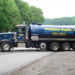 Large blue septic truck