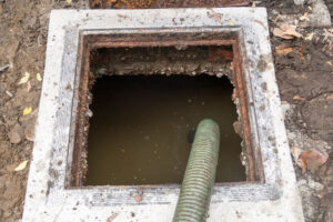 Draining an old septic tank that has been abandoned on a property